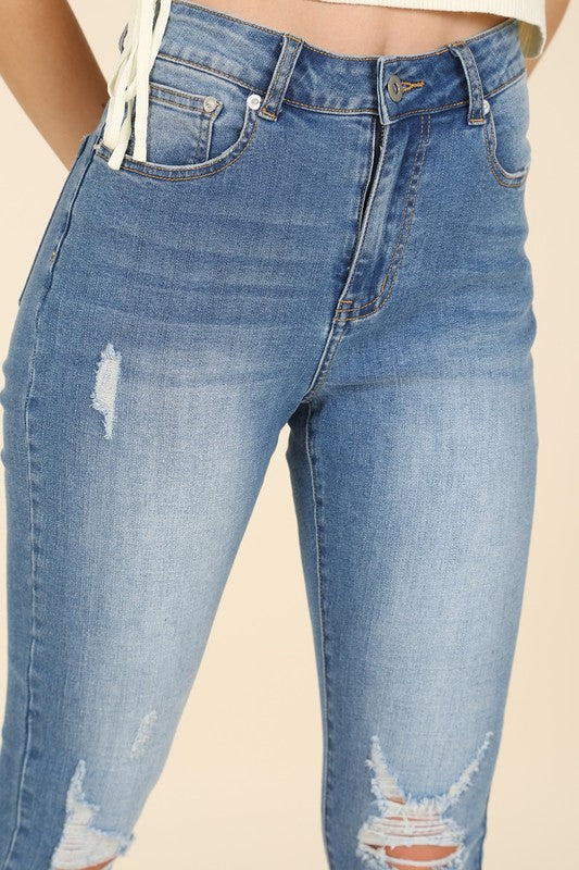 Dark wash distressed skinny jeans